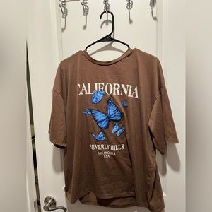 Brown oversized t shirt. Fits small and medium!